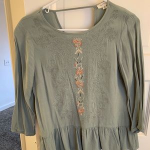 Embroidered peplum top